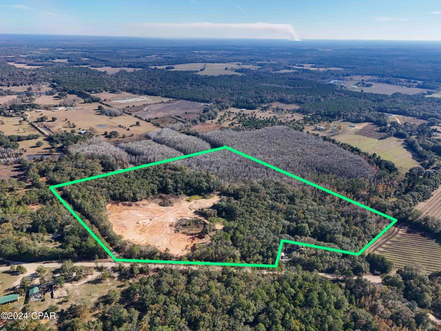 36 MOL Acre Industrial Zoned Dirt Pit in Holmes County. Property is a primarily sandy clay pit, with some scattered timber, and recreational features. This property rests approximately 1 Hour from Panama City Beach and Beaches International Airport, and is a 45 minute drive from Dothan, AL. Schedule your showing on this tract today!