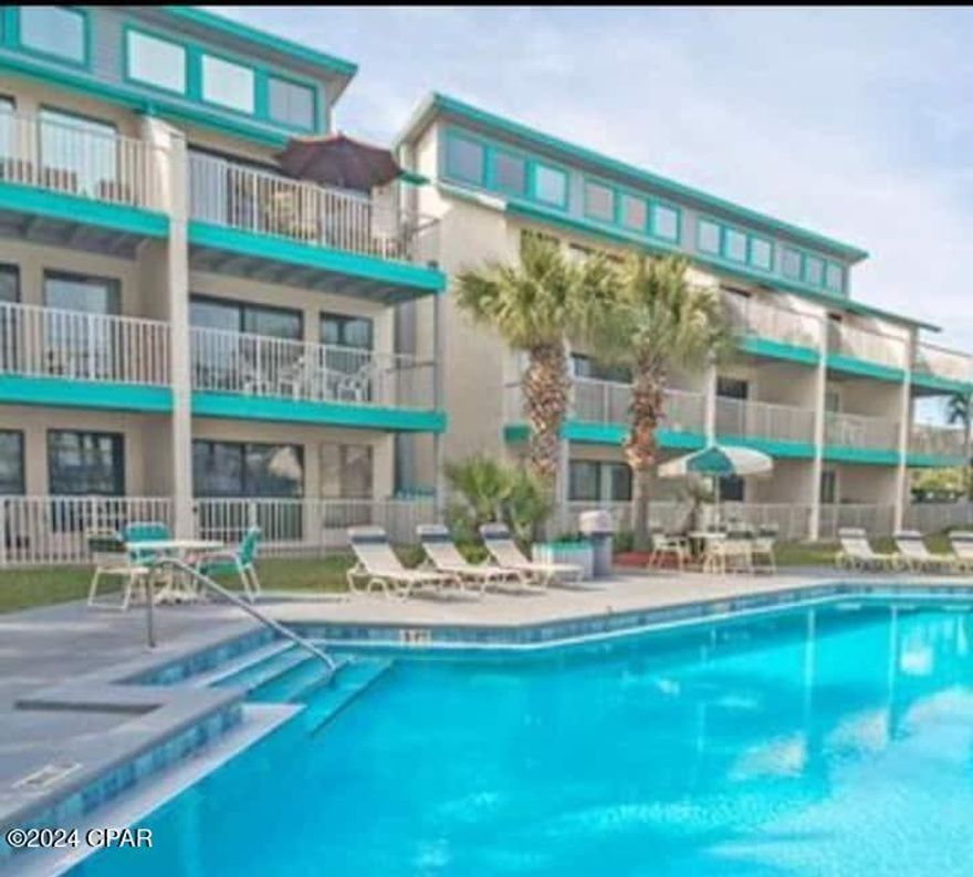 Escape to relaxation and indulge in the beachy amenities of this charming condo! Just steps to the absolutely gorgeous white sand and turquoise waters of the Gulf. Situated on the tranquil east end of Panama City Beach, near St. Andrews State Park, this beachfront condominium complex offers the ideal tropical setting. Sit on your balcony and listen to the waves, or take a dip in the pool just below. Peek-a-boo view of the water from this second story oasis. Due to its popularity among vacationers, this condo generates significant income. Enjoy the benefits of owning your own vacation home while the rental income offsets the costs. This unit has undergone renovations, featuring new drywall, paint, granite countertops, tile backsplash, appliances, A/C, water heater, and smooth-gliding sliding glass doors. Sq ft and dimensions approximate.