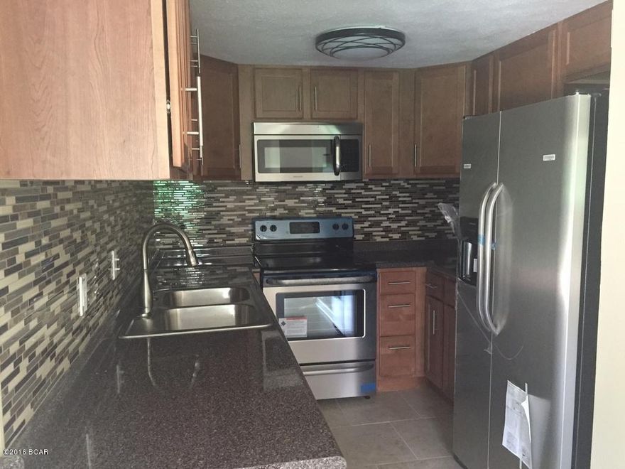 Completely remodeled 3BR/2BA home inside and out.  The exterior has a new metal roof and paint.  The interior has a new kitchen with stainless Steele appliances with tile backsplash. New custom tile shower in both baths along with new paint throughout. Beautiful tile work! New HVAC. Affordable living @ $85,000 turn key ready!