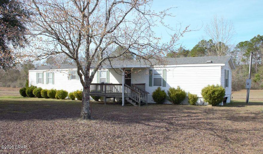 Welcome to this rare opportunity in Bonifay, FL — a beautiful 2.76-acre property featuring a semi-private fishing pond, wide open spaces, peaceful country views, and stunning sunsets.
The property includes a 3-bedroom, 2-bath manufactured home (1999), being sold AS-IS and in need of TLC — a true fixer-upper and value-add opportunity. The home offers a front covered porch and a back screened porch, perfect for enjoying the quiet setting and watching the wildlife. The roof was replaced approximately six years ago, providing a solid starting point for renovations or updates. The property is served by a private well, adding value, independence, and lower ongoing utility costs. This property offers incredible flexibility: remodel the existing home, replace it with a newer manufactured home, or build your dream home from the ground up — the choice is yours. With plenty of open land, there is room for RV parking, gardens, workshops, outdoor recreation, or future expansion. This is an ideal property for investors, DIY buyers, outdoor enthusiasts, or anyone looking for a private country retreat with space, privacy, and potential.
Conveniently located just off Hwy 79 and I-10, and approximately 50 minutes from the beaches of Panama City Beach, this property blends peaceful rural living with easy access to town and the coast.
With acreage, a pond, a private well, and a fixer-upper home with great potential, this is a rare opportunity to create something truly special. Don't miss your chance to own a unique property where land, water, and opportunity come together.