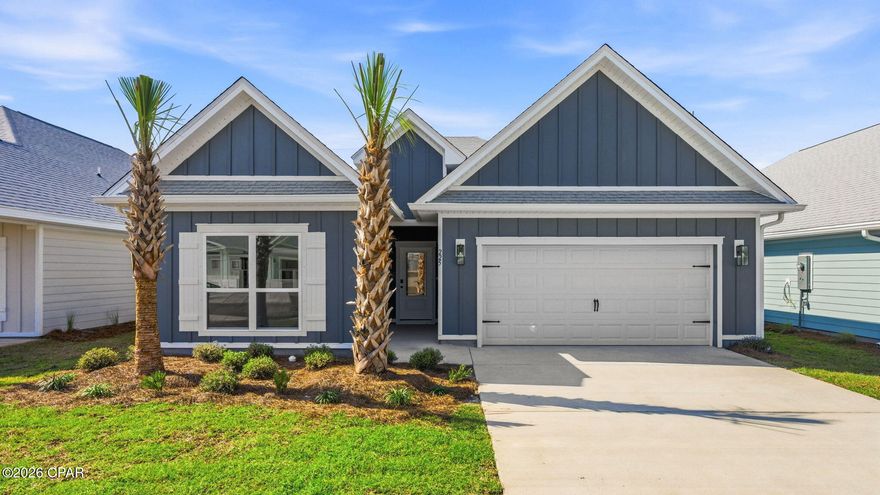 Welcome to 223 Dama Del Mar Way, a new home at Caballeros Estates at Hombre in Panama City Beach, Florida. This home is under construction and has four bedrooms, two full bathrooms and a single car garage. As you enter this home you will find a bright entry with EVP flooring throughout the home. The foyer leads to the spacious living area that is designed for comfortable living. In the open concept living area you will find the kitchen with a center island that has space for seating.

The kitchen has quartz countertops and white cabinetry for all your storage needs. A corner pantry allows space for your dry goods and small appliance storage. An appliance package is included with a stove, microwave and dishwasher. The primary bedroom is located off the living area it features EVP flooring, trey ceilings with a ceiling fan and an ensuite bathroom. The primary bath has a dual sink vanity with quartz countertops and lower storage drawers and cabinetry. There is a separate shower and soak tub as well as a large closet for your wardrobe needs.

Each guest bedroom has EVP flooring and ample closet space. A shared bathroom has a vanity with quartz countertop and lower cabinetry for storage. Outside this home you will find a landscaped entry, 30-year dimensional shingles, and Hardie® exterior.