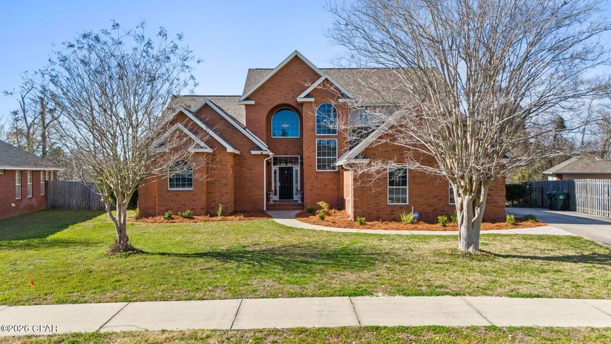 Welcome to desirable Mowat Highlands! This custom built brick home sits on a quiet street and spans over 2800 square feet offering 4 large bedrooms, 3 full bathrooms and 1 half bathroom. Beautiful highlights of this home include a grand foyer entrance featuring 20 foot ceilings, an open staircase, 10 foot ceilings with detailed crown molding throughout the lower level, spacious walk-in closets and a wonderful first floor master suite. The kitchen is updated with granite counters, stainless steel appliances and under cabinet lighting while being open to the living room featuring a gas fireplace and french doors leading to the back deck. The fully fenced backyard offers you complete privacy with no backyard neighbors. The sparkling, freeform saltwater pool is amazing, featuring a 12 foot sun shelf, 3 deck jets and multi LED lights, surrounded by an extended paver patio with room for entertaining. This neighborhood has no HOA and is conveniently located near top schools, restaurants and Tyndall AFB. Call today to set up a viewing appointment.