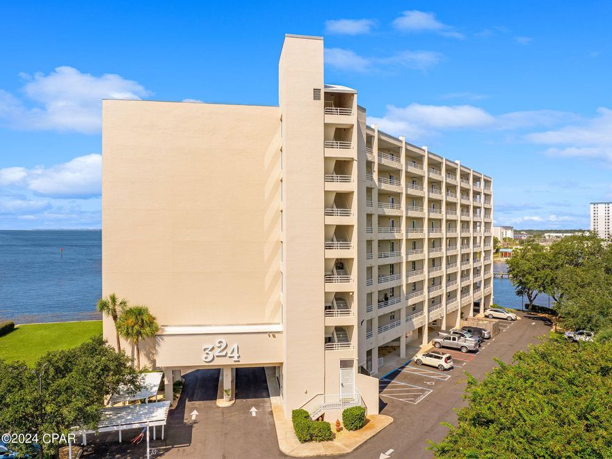 Under contract. Seller will consider back up offers.Stunning Waterfront Condo for Sale in the Cove. Discover luxurious living in this exquisite waterfront condo situated in the highly desirable Cove Harbor condominium. With breathtaking bay views and a prime downtown location, this property offers the perfect blend of tranquility and urban convenience.  Located walking distance to downtown, you'll have easy access to trendy shops, gourmet restaurants, breweries, marina and vibrant nightlife, while being nestled in the peaceful Cove neighborhood. The entire building has been remodeled. All new high impact windows and doors, paint and parking lot. The unit features granite countertops in  the kitchen, newer appliances, HVAC and water heater.Key features: Spectacular bay views, private balcony, where you can see the sunsets, oversized swimming pool, boat dock, gazebos and community lounge.