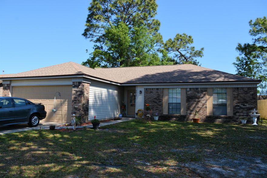 You will not find a home as well kept and clean as this in this price range.  Don't miss the fantastic curb appeal as you pull up to the drive way. Notice the 2 car garage and extra parking space in the drive. A nice galley kitchen leads from 2 car garage entrance and into a formal dining room off of living area. Sliding glass doors take you to a nice back yard with an open porch area and lots of space to make your own. Carpet in all three bedrooms. Roof put on in 2011. Bedrooms are all a good size. This is the perfect starter home or investment property.