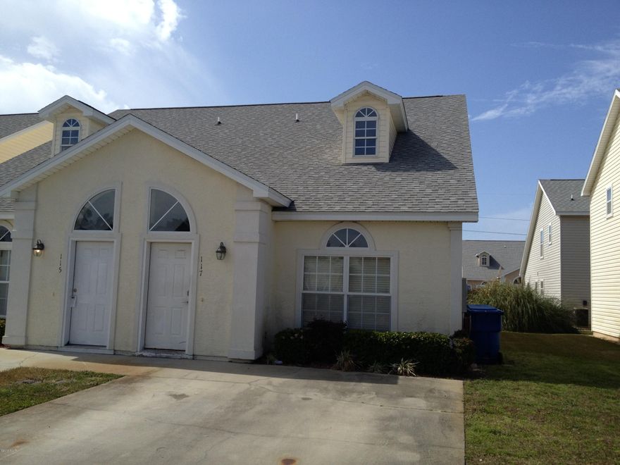 Central Panama City Beach, and just a short distance to the beach. This town home is located in Palm Cove featuring a community pool. This home is a three bedroom two and a half bath unit with one bedroom down and two up. Conveniently located close to shopping and dining and schools.