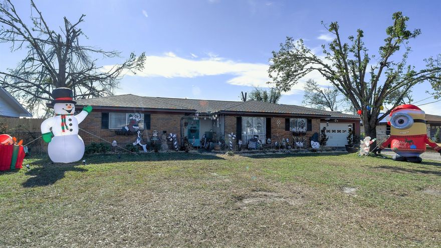 QUAINT BRICK HOME READY FOR A NEW OWNER!  The interior features 4 bedrooms, 3 baths, 1700+ SF, a semi-open floorplan with split bedrooms & a 2-car garage. The living room has a wood burning fireplace & is open to the dining area (complete with floor to ceiling shelving). The kitchen has ample counter & cabinet space & has an attractive backsplash. There are two master suites (one handicap accessible).  The exterior has a covered back porch, an open back patio & a sectioned off firepit with seating – perfect for entertaining.  There is also a play area, a garden area, 2 sheds & a new privacy fenced backyard.  The Roof was replaced in 2018 (post hurricane). The HVAC & Water Heater are newer & the handicap accessible bathroom was installed within the past few years. Call now to see this home!
