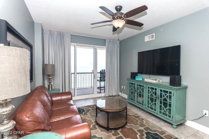 TOTALLY REMODELED SUNRISE BEACH 2BR + BUNK ROOM + OUTDOOR CLOSET! Sunrise Beach 2309 is one-of-a-kind with totally remodeled kitchen, master and guest baths, ceramic tile flooring throughout, newer HVAC with Coastal Green Air energy conservation system, and a coveted outdoor owner closet (valued at $13K+) just outside the elevator. It features a super-efficient floorplan, with oversized master and guest bedrooms + a large bunkroom, and 2 baths.  This gulf front condo lives like a true 3 bedroom and sleeps 8! This condo is ultra clean, meticulously maintained, professionally remodeled and decorated, and will convey fully furnished and rental ready.

The gourmet kitchen is fully equipped. Recent appointments include a refrigerator, custom shaker style cabinets, and tile backsplash. Master bedroom is Gulf front with balcony access. On-suite master bathroom has two closets and features custom double vanity and custom walk in shower with amazing and unique frameless shower doors. Guest bedroom and bonus bunk room are larger than most. Bunk room features a pop-up trundle. Guest bath also has a custom vanity that matches the master bath. There is plenty of storage throughout this unit with the ample closets and oversized laundry area complete with full sized washer and dryer. An exterior storage closet also conveys with the sale which is great for catching beach chairs etc. and keeping sand out of the condo. EXCELLENT RENTAL INCOME POTENTIAL. Seller has installed a continuous drain Dehumidifier and 2016 newly installed HVAC has been fitted with the revolutionary Coastal Green Air energy conservation system which allows for advanced management of utility usage to reduce costs and increase your bottom line. 
Less than a mile from Pier Park, the Sunrise Beach development is centrally located to all the dining and entertainment PCB is famous for. Sunrise Beach has an amazing amenities package to include: 2 elevated Gulf front pools (one heated seasonally) 2 hot tubs, large sun deck, spray park, owners lounge with full kitchen, 2000sqft Gulf front exercise room, theatre, Gulf front gas grills, & plenty of underground parking allowing for access to the condo without exposure to the elements! SUNRISE BEACH IS OWNER CONTROLLED which means the homeowners own the gym, the pools, and receive the income from the Beach Chairs, etc.