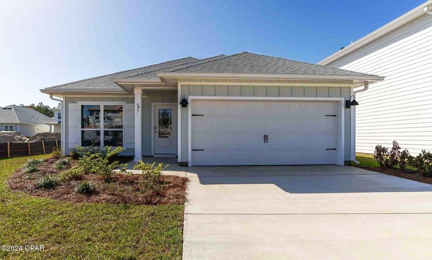 Welcome to the 477 Wolcott Way, located in the Bayside at Ward Creek community in Panama City Beach.
This brand new, actively building community is located 2 miles north of highway 98, just minutes to the ''World's Most Beautiful Beaches'', shopping, dining, and entertainment at Pier Park. Enjoy the sunshine out by your community pool, while cooking out in the outdoor kitchen, or spend time with family at the playground.
The ''Oakley'' floorplan is a quaint Florida Style cottage, efficiently laid out with just the right amount of open space for entertaining. As you enter the foyer, you are greeted by a flex space with a large picture window that allows the beautiful Florida sunshine to fill the front of the home. Continuing down the hall you will see the open concept kitchen, dining, and living area, complimented with vaulted ceilings which lend a grand feel to the heart of the home. The kitchen is accented with ivory painted, Shaker style cabinetry, a grand center island, and elegant quartz countertops. 
Nestled in the back of the home for privacy is the primary bedroom and bathroom suite with EVP flooring flowing seamlessly from the living area.. In the bathroom your will find a large walk-in closet, soaking tub, dual sink vanity, and standing shower. The two additional bedrooms are located down a hallway just off the kitchen and dining area. Here you will also find the full guest bathroom, linen closet for extra storage, and the laundry room with shelving above the washer/dryer hookups. 
Entertain with ease under the covered back patio, accessible through the full-glass backdoor in the living room. 
Give us a call today to schedule a tour of your new home. The salt life is calling!