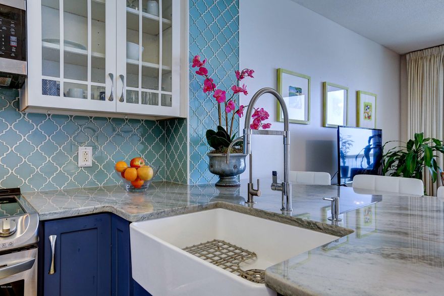 'CURRENTLY UNDER CONTRACT, SELLER ACCEPTING BACKUP OFFERS' Gorgeous views from this 21st floor unit.  The one bedroom, two bath with bunks floor plan sleeps 6 comfortably.  You will love the completely renovated kitchen with Brazilian quartzite counter tops, glass tile back splash, double oven, Fisher & Paykel double dish drawer dishwasher, Lebherr refrigerator, and reverse osmosis 5 stage water filter.  All of the furniture is new including a luxury mattress in the sleeper sofa.  The AC and water heater were replaced in 2016. The Association dues are a low $1,185 a quarter and include everything! Yes, electric, water, cable, internet, trash, etc.  You have no other bills to pay.  The property has two pools (one heated), hot tub, fitness center, community room, covered parking garage with walk over and three elevators.  Located next door to Schooners where you can enjoy dining and entertainment, you are also conveniently located to many restaurants and grocery stores.  You are also in walking distance to St. Andrews State Park.  Don't miss the opportunity to own this little piece of paradise.  There is a video tour located under photos for a better view of the unit.  The television in the living room does not convey with the unit, but will be replaced with the tv from the bedroom.   All measurements are approximate.  Please measure for yourself if this is important.