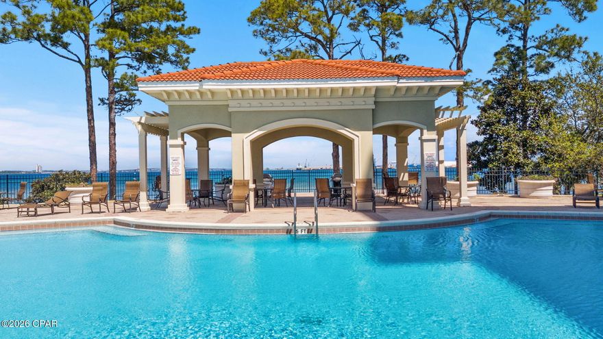 Fantastic New Price for a piece of Paradise!! Magnolia Bay Club is the epitome of a relaxed Florida lifestyle. From the gated entry to the manicured entrance road with swaying palm trees to the beautiful fountains that guide you home; this is what you have been looking for! Welcomed in by a foyer hall leading back to a top floor 10th story view of the Bay, the bright and airy living room with crown molding and tile floors makes a perfect respite from the cares of the day. This large open floor plan makes living easy with the dining room just off of the kitchen and eat-in bar with granite countertops and SS appliances. Double entry doors open into the master bedroom entry foyer and into a bright en suite with double vanities, a jetted tub and standup shower. Just off that is the walkin closet and bedroom with an extra large slider onto the roomy balcony. It's just here, when you know that you have embraced the Florida lifestyle looking over the fantastic, open Bay. Back inside, the entry foyer opens up to two additional bedrooms; one with it's own full bath and walkin closet. The other bedroom has pocket doors and walkin closet, making this room extremely versatile and could double as an office or playroom, as well as guestroom. Outside, the Florida lifestyle continues with a beautiful, waterfront pool, kayak/canoe launch, bike racks, walking paths and a community room with a gym and restrooms convenient to the pool. The secure aspect of the gated entry and covered parking bring a layer of comfort so you can enjoy what you came here for! No short term rentals allowed in this complex, as well. Long term rental only. This is one to put on your list and make sure you see!