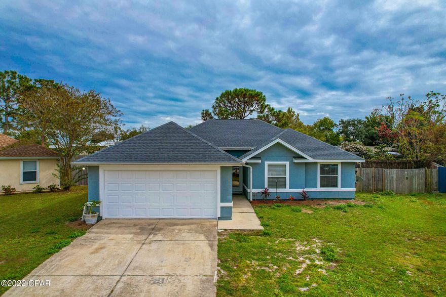 CURRENTLY UNDER CONTRACT, SELLER WILL CONSIDER BACKUP OFFERS. This beautiful home has 3 bedrooms, 2 bathrooms and 1,400 sq. ft. of comfortable living space in the Hidden Pines Subdivision with NO HOA! This home has an open and airy feel, with lots of natural light throughout. The foyer leads into a nice open living room, with the formal dining room nearby. In the kitchen you'll find new cabinets, stainless steel appliances, granite countertops, a large pantry, a breakfast bar and an eat-in nook. You'll love the tray ceiling and walk in closet in the primary bedroom! It also features an en-suite bathroom with a walk in shower, garden tub, and dual sinks. The other two bedrooms offer plenty of space for sleep and study. Tons of updates and upgrades, including a brand new roof!! When you step outside into the fully fenced in backyard, you'll begin to imagine all the entertaining you can do there with family and friends.This home also features a two car garage and laundry room.
The home is situated on a cul-de-sac, has access to a paved walking path to Patronis Elementary School, is located within 5 minutes to the Navy Base, and a short drive to the public beach access.