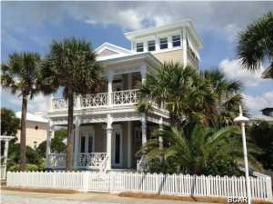 ''Be Breezy''....EXCELLENT INVESTMENT OPPORTUNITY WITH BUILT IN RENTAL INCOME that conveys with sale!! Enter the gate beneath lush palms and be surrounded with warmth and charm that will take you away from all your cares to a world you have always dreamed about. After a restful night of listening to the waves, grab your morning coffee and head to one of your double loaded front porches to start your day with a breath of fresh salt air and sunshine! With room for everyone to spread out, this home offers a spacious living/dining and kitchen area on the main level as well as a ''1st level'' bedroom and bath. The second level's Master suite has double French doors leading to a large balcony with breathtaking view and a great spot for a hammock to catch a breeze and an afternoon nap! B