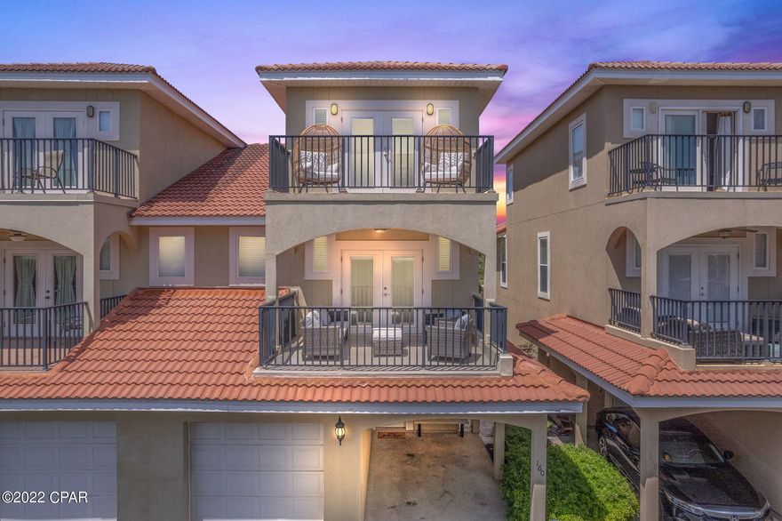 Low density and on the west end of PCB, townhome units like this rarely come to market for sale! This 4 bedroom, 3 and a half bathroom Mediterranean style home is walking distance to the World's Most Beautiful Beaches and provides Gulf views from the third floor! Completely turn-key and close to everything, this unit has very strong actual rental numbers as well as projections. Upgrades include stainless appliances, granite countertops, high end lighting and furnishings. HVAC systems new in 2019. One car garage, car port, and parking space provide ample parking for cars or a golf cart to get around. This home has been lovingly cared for and masterfully decorated and will make an excellent vacation home, primary home, or investment property! Call to schedule a showing today!