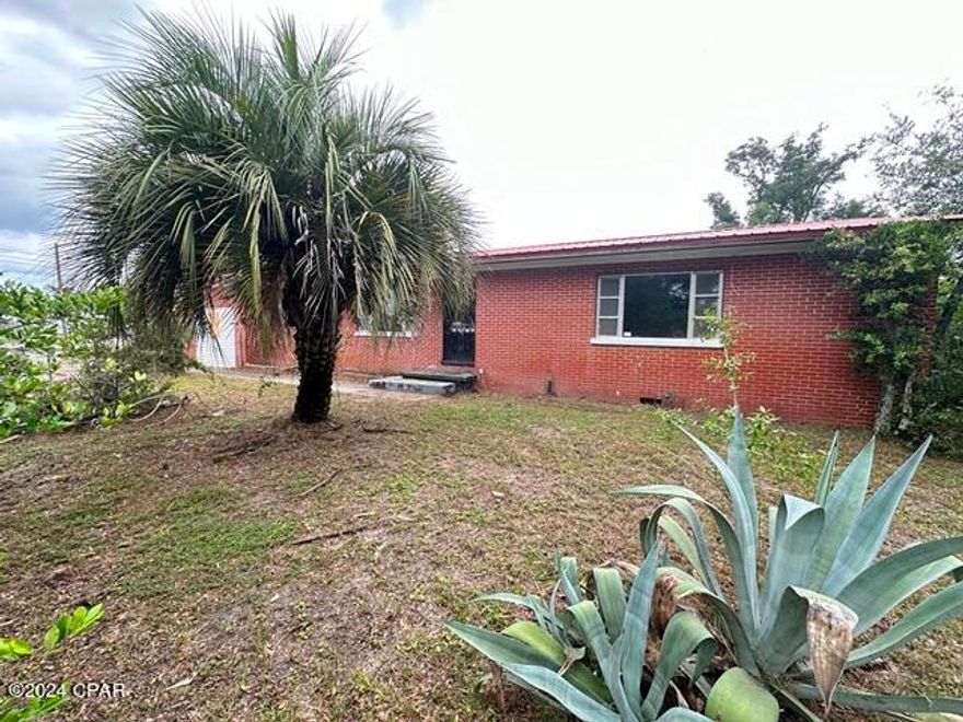This well-built ranch-style home sits on a corner lot, offering a rare opportunity it has ample basement space a feature not often found in the area. The home has great potential with numerous bonus rooms, allowing for versatile uses to fit your needs and lifestyle. Its convenient location is just minutes from downtown Panama City and the marina, providing easy access to local amenities.
Currently zoned for residential use, the property has a strong possibility for rezoning to light commercial, making it an excellent investment opportunity. The fenced-in front yard offers privacy, while the covered back porch provides a comfortable outdoor space. With multiple options for ingress, egress, and parking, this corner lot maximizes convenience and functionality