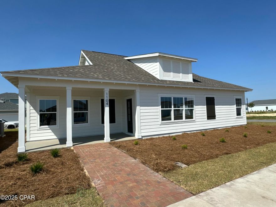 This low-maintenance lock-and-leave home is perfect if you're ready to stop doing yard work and enjoy the phenomenal lifestyle that waterfront SweetBay has to offer! This phase allows for shorter term rentals, perfect for a second home or investment! The low fees cover all amenities, landscaping, irrigation, and even routine exterior maintenance! (Request fee sheet for details.)The Magnolia III plan by Harris Doyle Homes is a thoughtfully designed open plan home with large covered front and rear porches and attached 2-car carport (optional garage) that could also be used for entertaining. This home includes granite countertops, stainless appliances and luxury vinyl plank flooring throughout the main living areas. The primary bedroom features a large walk-in closet and tile shower. SweetBay is a walkable and golf-cart friendly community with unrivaled amenities: dock with Bay and Gulf access, boat launch for kayaking, private beach, paddle boarding, fishing, parks, junior olympic resort pool complexes, fire pits, grilling areas, sports court, miles of trails, Publix-anchored town center and future amenities including a marina! New home buyers even get priority access to top-rated University Academy, the #2 K-8 school in the state of Florida!