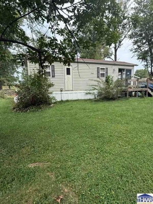 323 E FRANKLIN ST, FARMERSBURG, IN 47850 - Image e549e2a0b77ed4fa4d2cd087e1f0381f/3149896286