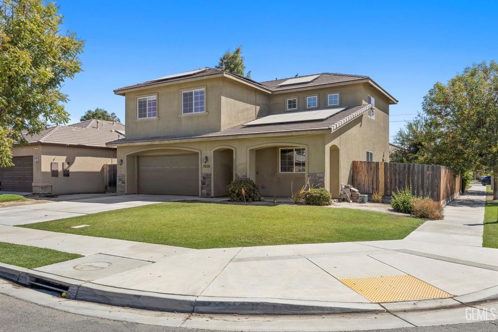 Photo of 7210 Olen Arnold Avenue, Bakersfield, CA 93307 (MLS # 202510228)