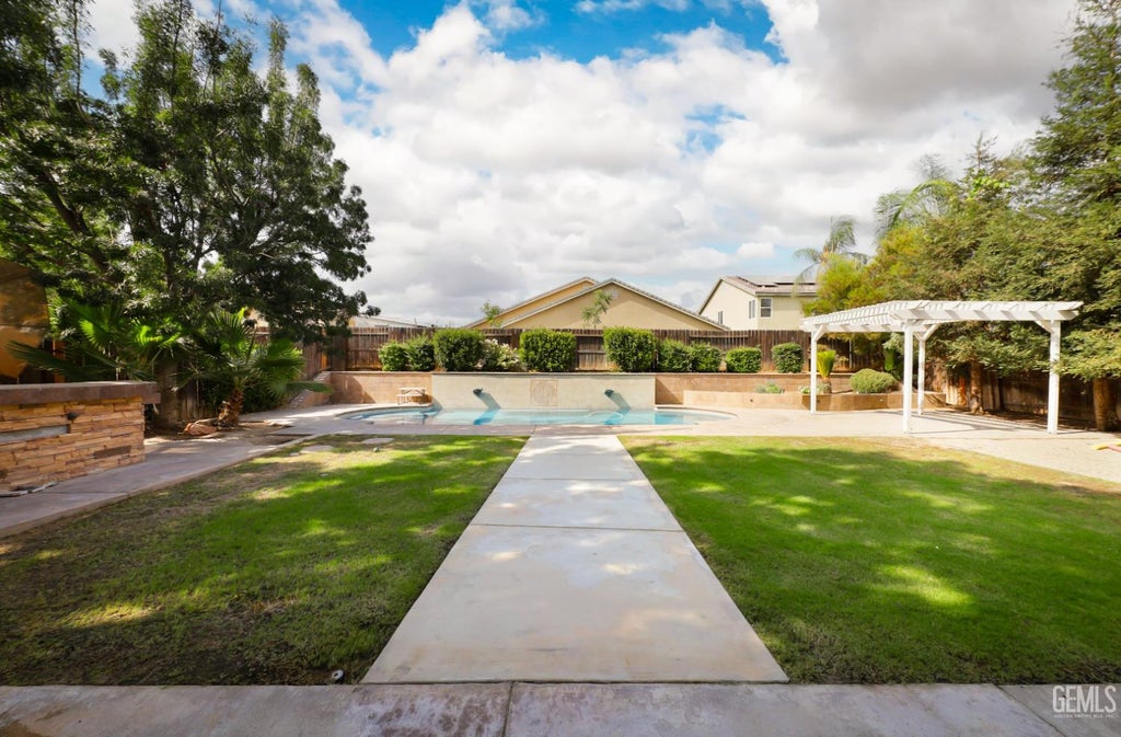Photo of 12426 Trackside Drive, Bakersfield, CA 93312 (MLS # 202608656)