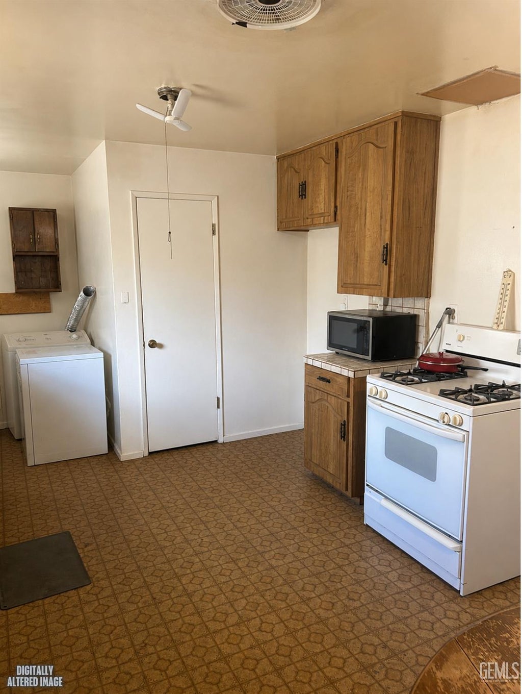 Photo of 501 Tyler Street, Taft, CA 93268 (MLS # 202609504)
