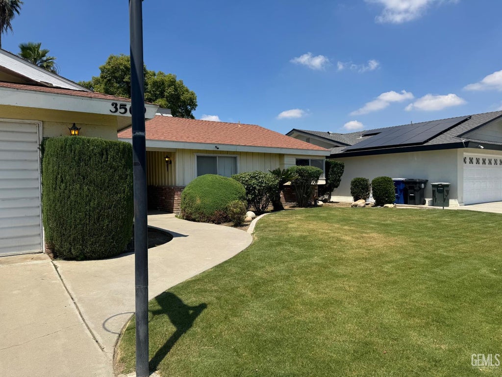 Photo of 3509 Mc Courry Street, Bakersfield, CA 93304 (MLS # 202607873)