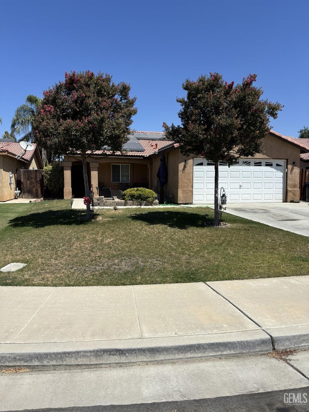 Photo of 328 W Pilot Avenue, Bakersfield, CA 93308 (MLS # 202608843)