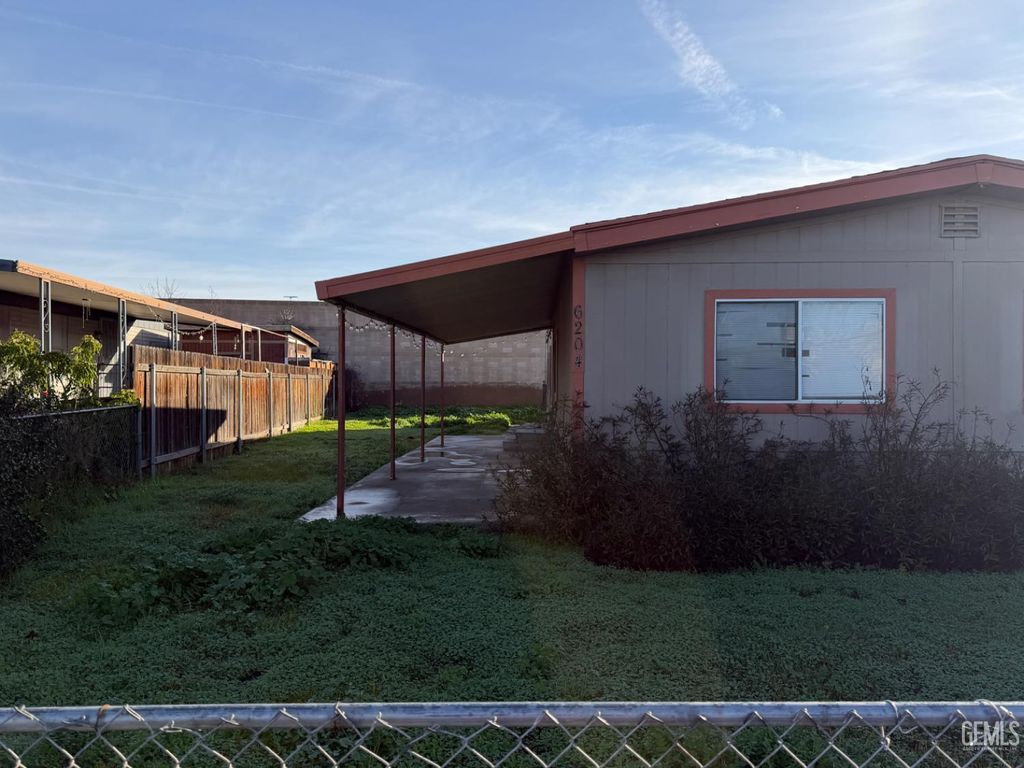 Photo of 6204 Dennen Street, Bakersfield, CA 93313 (MLS # 202513885)