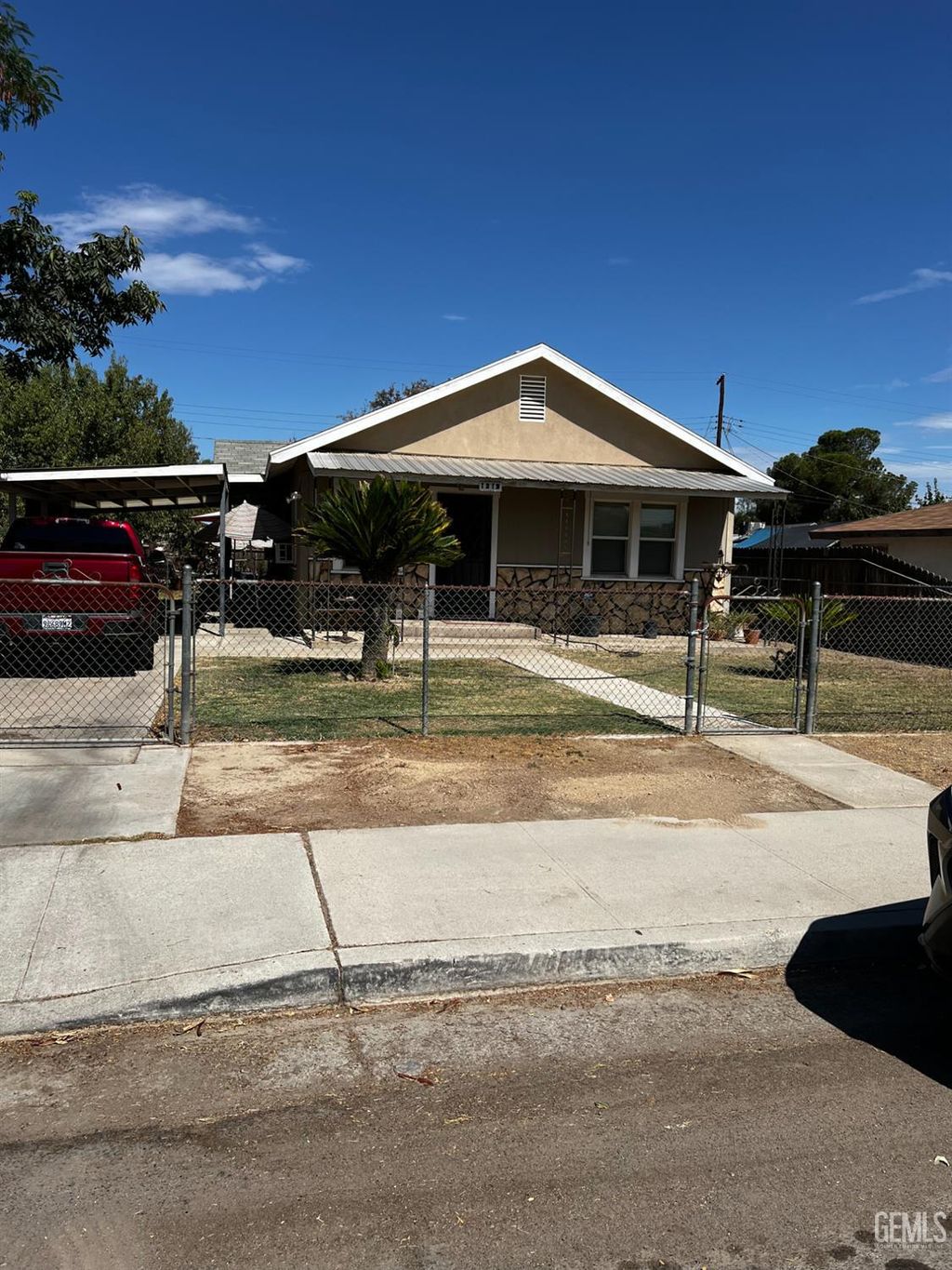 Photo of 1218 Feliz Drive, Bakersfield, CA 93307 (MLS # 202511078)