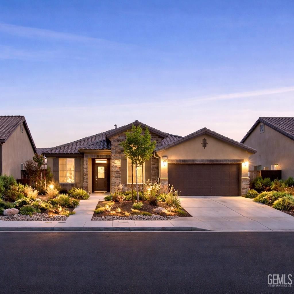 Photo of 9411 Flowertree Drive, Shafter, CA 93263 (MLS # 202603704)