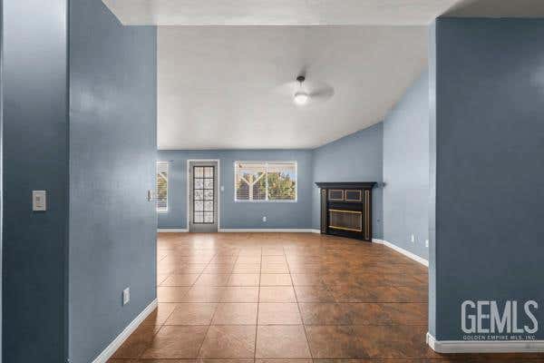 Photo of 603 Calle Del Sol St, Bakersfield, CA 93307 (MLS # 202608359)