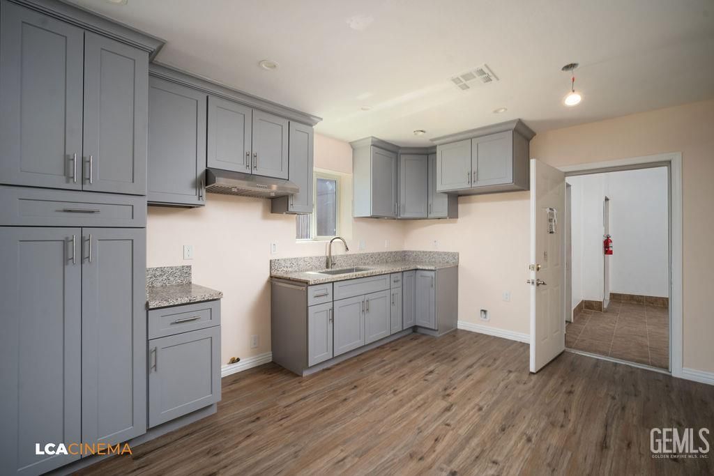 Photo of 428 Center Street #A, Taft, CA 93268 (MLS # 202511111)