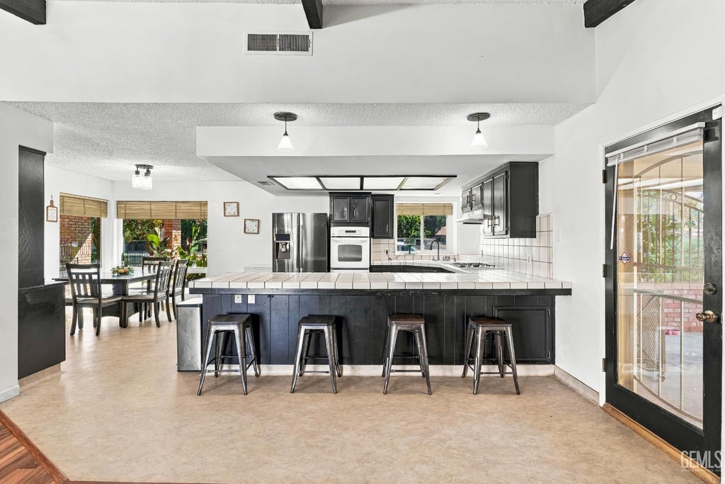 Photo of 7412 Olive Drive, Bakersfield, CA 93308 (MLS # 202610430)