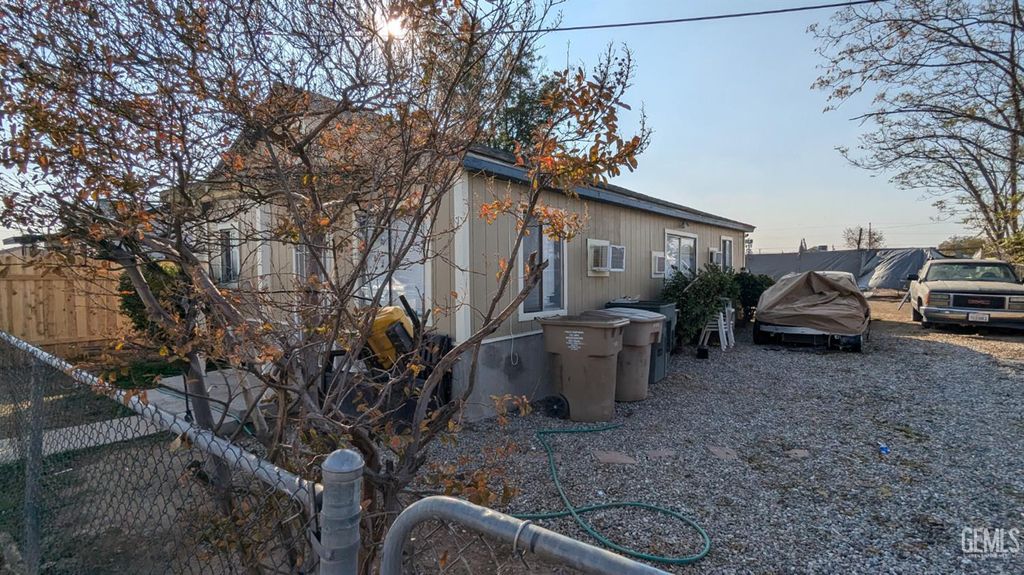 Photo of 408 Powell Lane, Bakersfield, CA 93307 (MLS # 202513300)