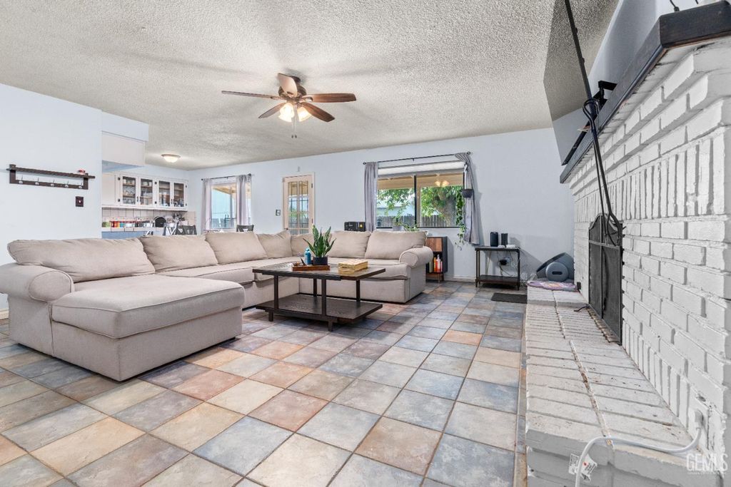 Photo of 8767 Greenfield Park Drive, Bakersfield, CA 93307 (MLS # 202603950)