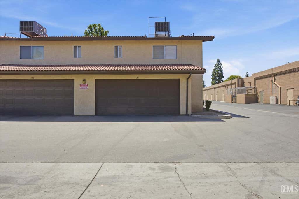 Photo of 6700 Nottingham Lane #26, Bakersfield, CA 93309 (MLS # 202607546)