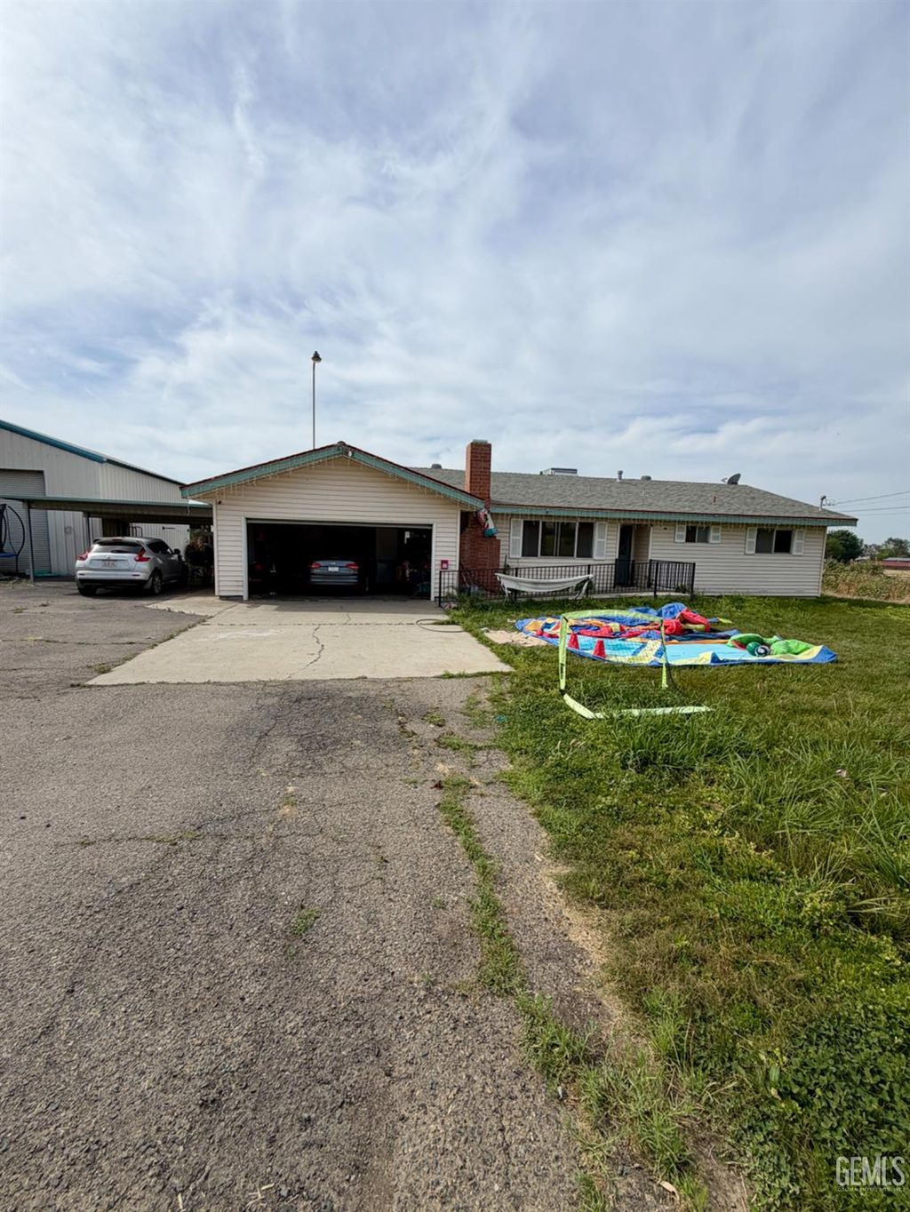 Photo of 679 E Mulberry Avenue, Porterville, CA 93257 (MLS # 202603794)