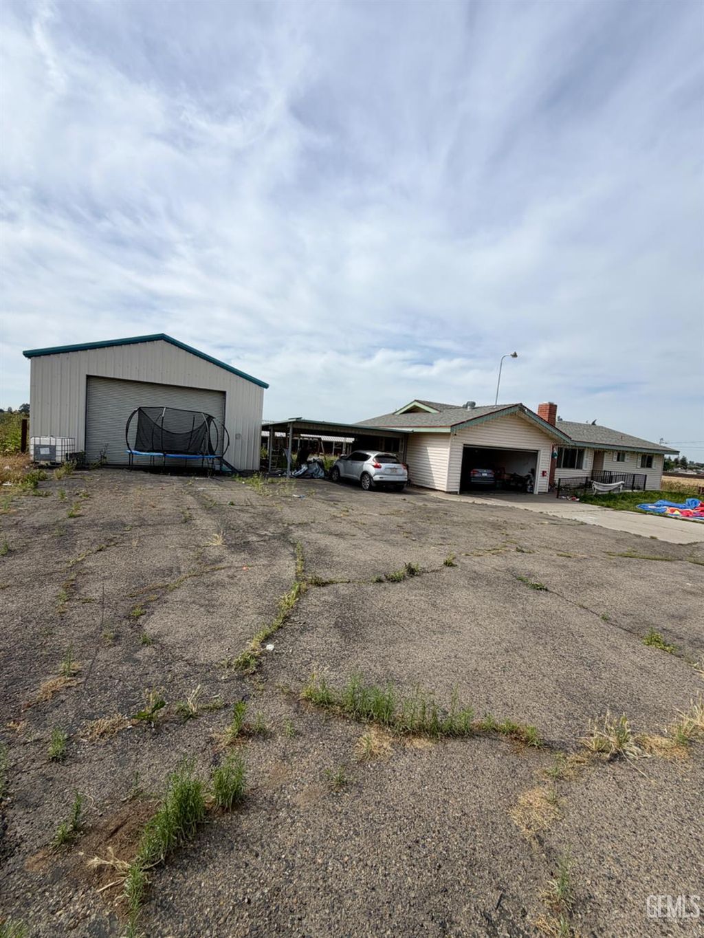 Photo of 679 E Mulberry Avenue, Porterville, CA 93257 (MLS # 202603794)