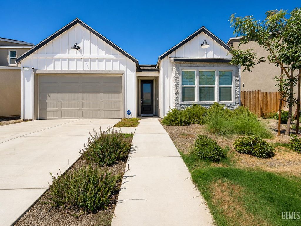 Photo of 7436 Musa Grove Avenue, Bakersfield, CA 93313 (MLS # 202607419)