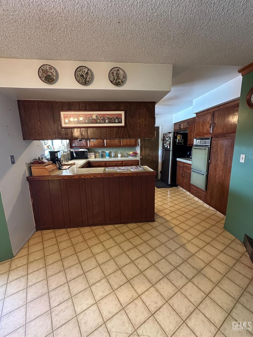 Photo of 4425 Charter Oaks Ave, Bakersfield, CA 93309 (MLS # 202511079)