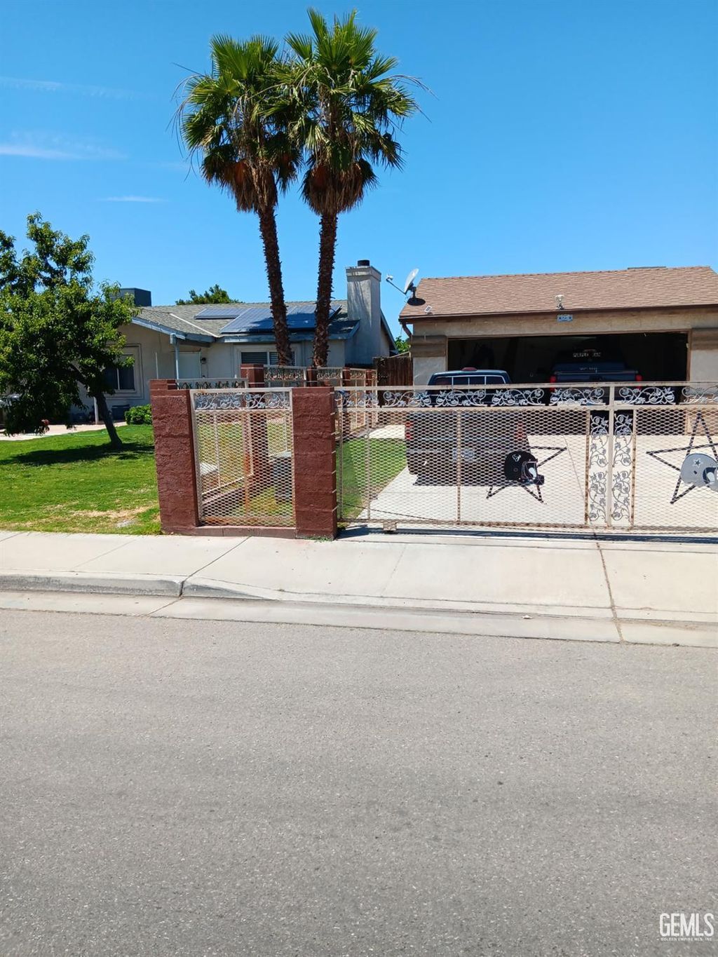 Photo of 412 Leeta Street, Bakersfield, CA 93307 (MLS # 202511004)