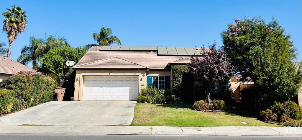 Photo of 9302 Cousteau Avenue, Bakersfield, CA 93311 (MLS # 202610054)