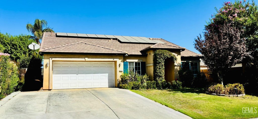 Photo of 9302 Cousteau Avenue, Bakersfield, CA 93311 (MLS # 202610054)