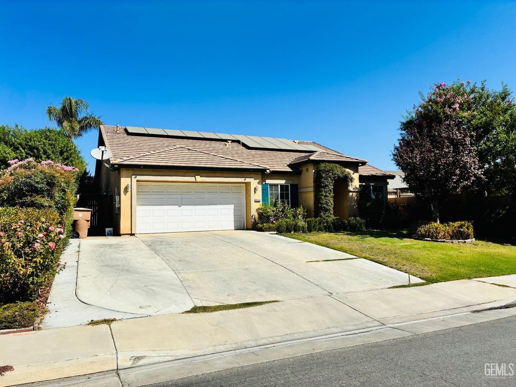 Photo of 9302 Cousteau Avenue, Bakersfield, CA 93311 (MLS # 202610054)
