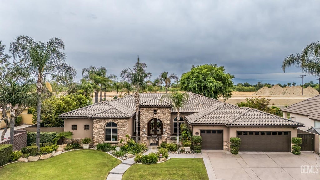 Photo of 10703 Queensbury Drive, Bakersfield, CA 93312 (MLS # 202603318)