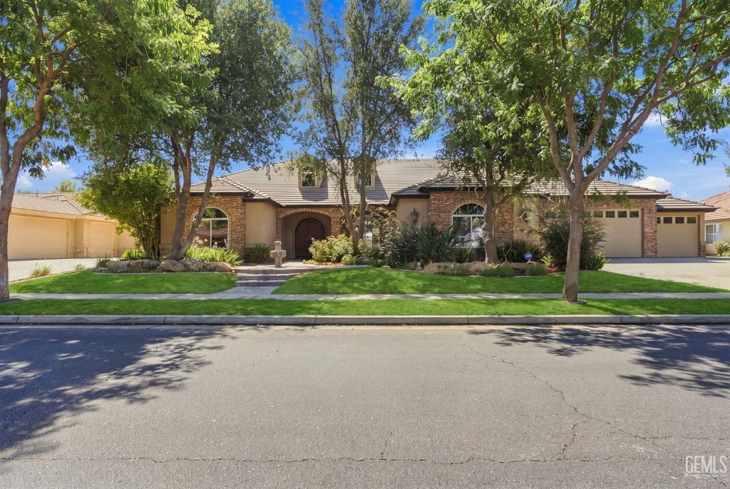 Photo of 10409 Hinderhill Drive, Bakersfield, CA 93312 (MLS # 202609833)