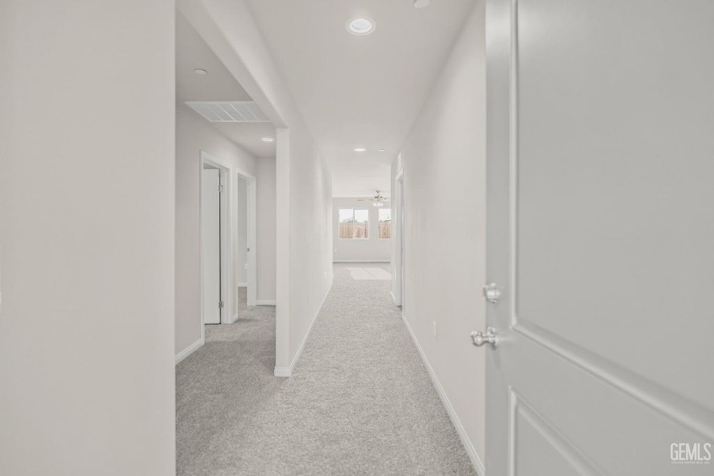 Photo of 606 Poinsettia Street, Bakersfield, CA 93307 (MLS # 202511215)