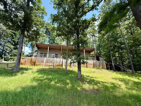 Photo of 107 River Shore Rd, Fulton, MS 38843 (MLS # 25-2653) Photo of 107 River Shore Rd, Fulton, MS 38843 (MLS # 25-2653)