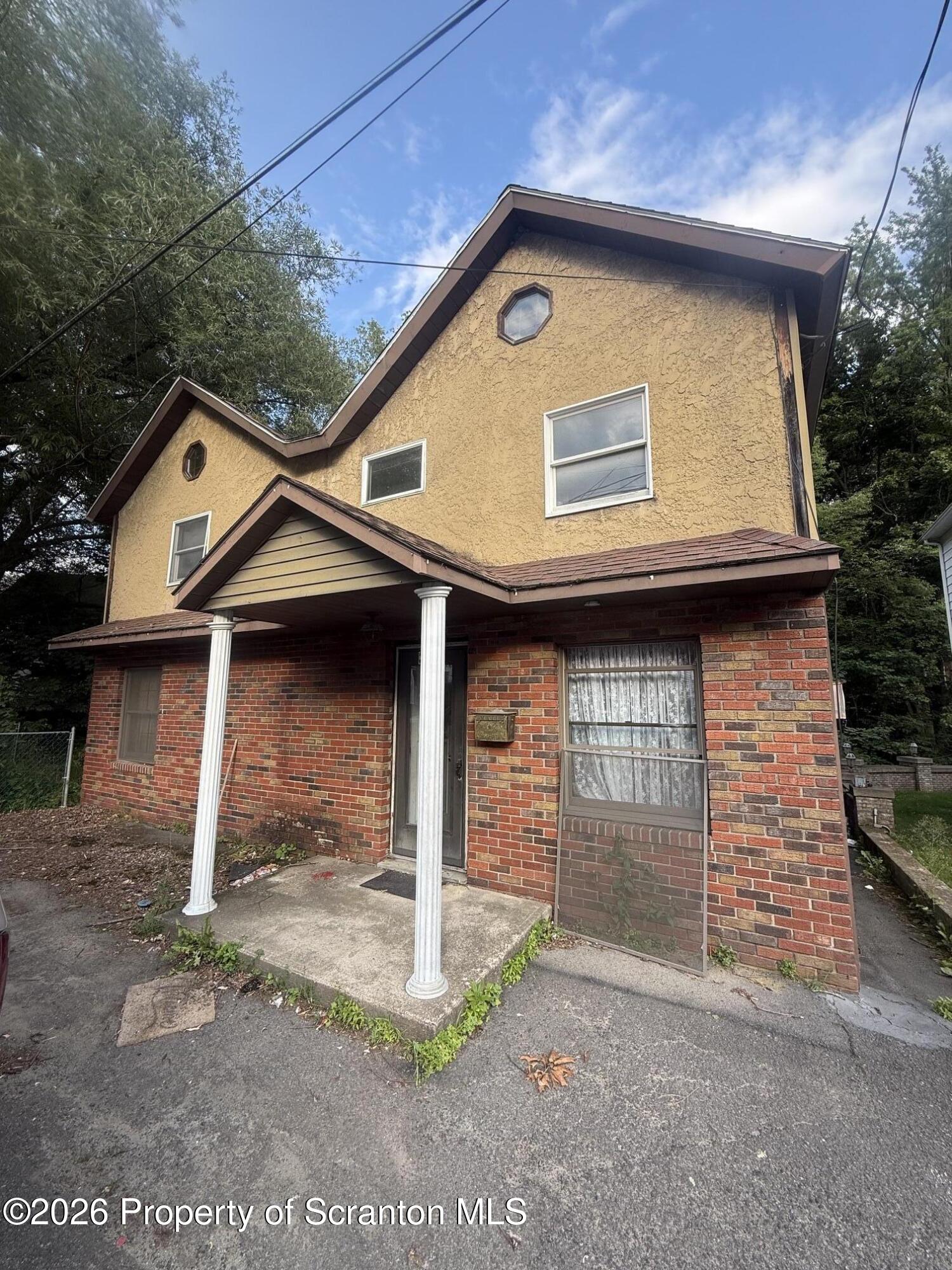 Photo 1 of 9 — 31 Midland Street, Simpson, PA 18407
