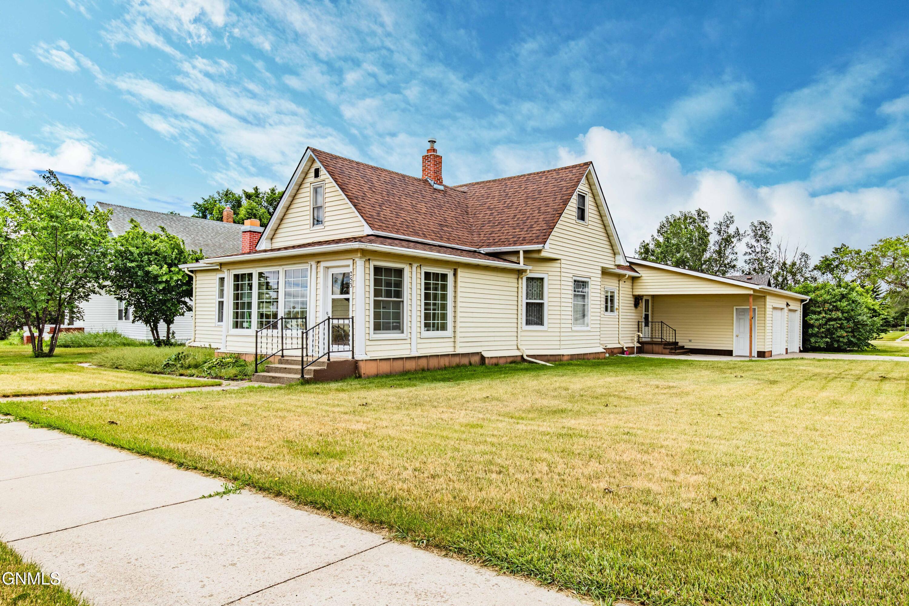 Photo 1 of 66 — 253 1st Street NE, Garrison, ND 58540