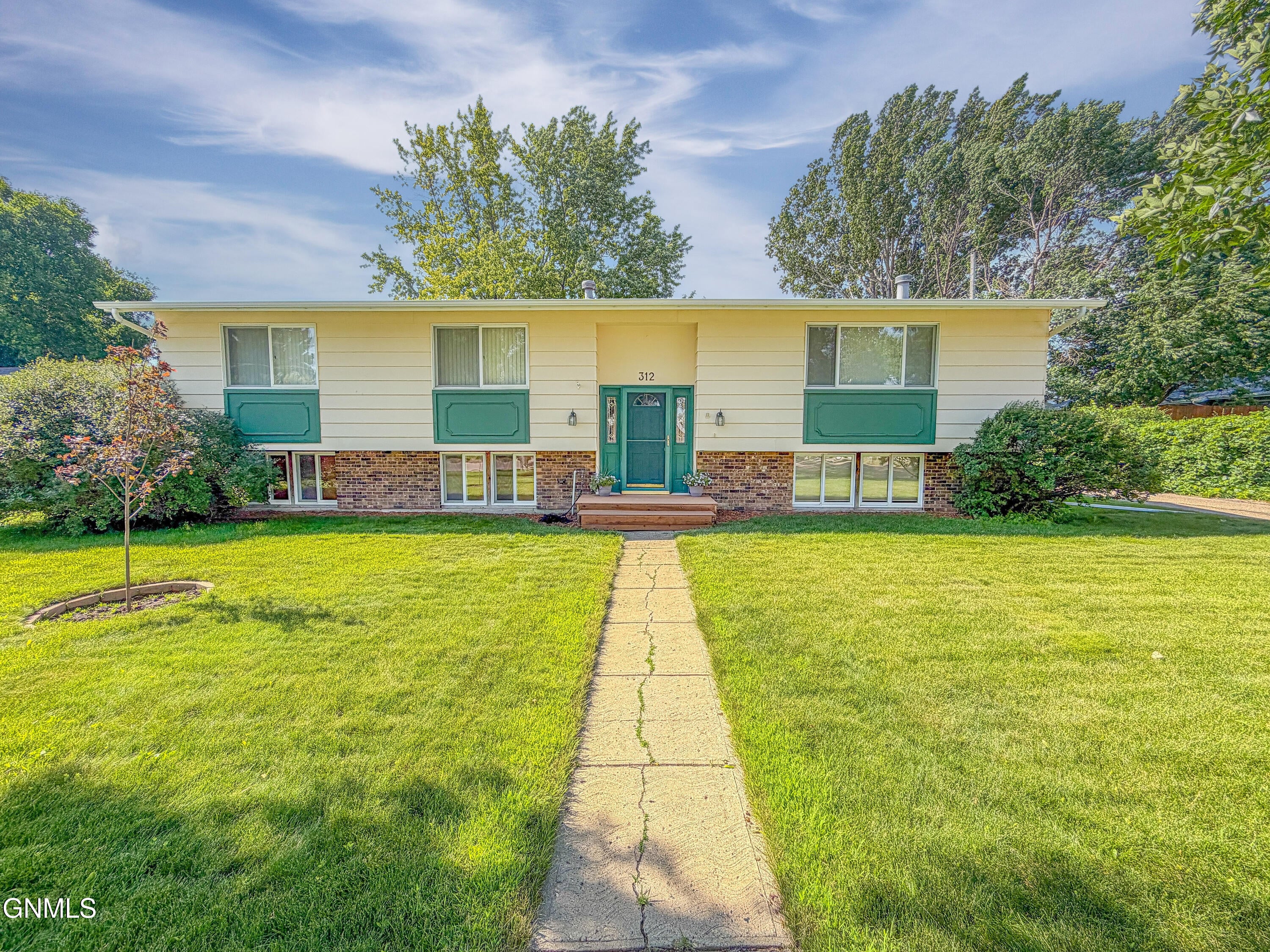 Photo 1 of 50 — 312 18th Street E, Williston, ND 58801