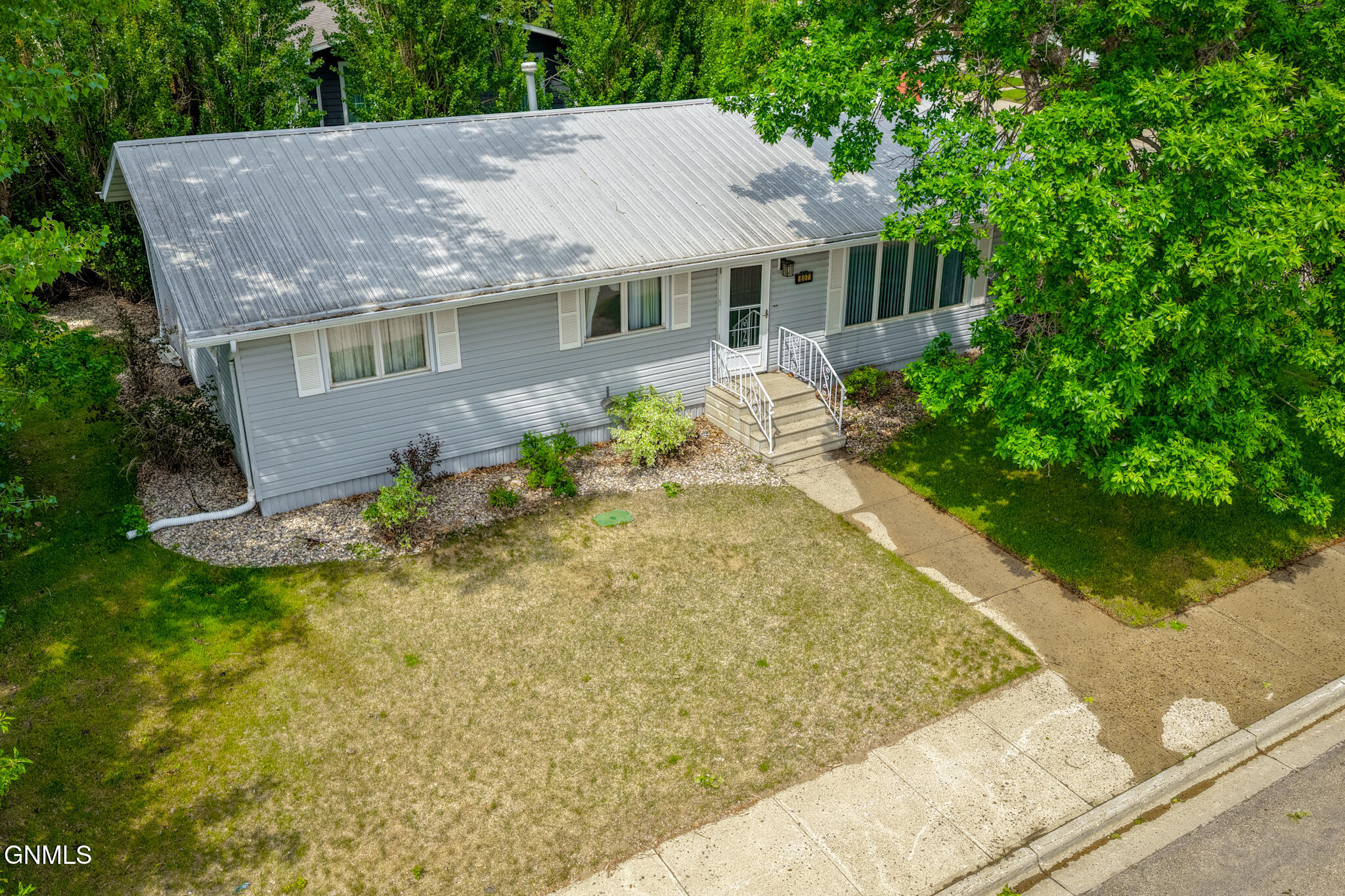 Photo 1 of 27 — 807 20th Street E, Williston, ND 58801